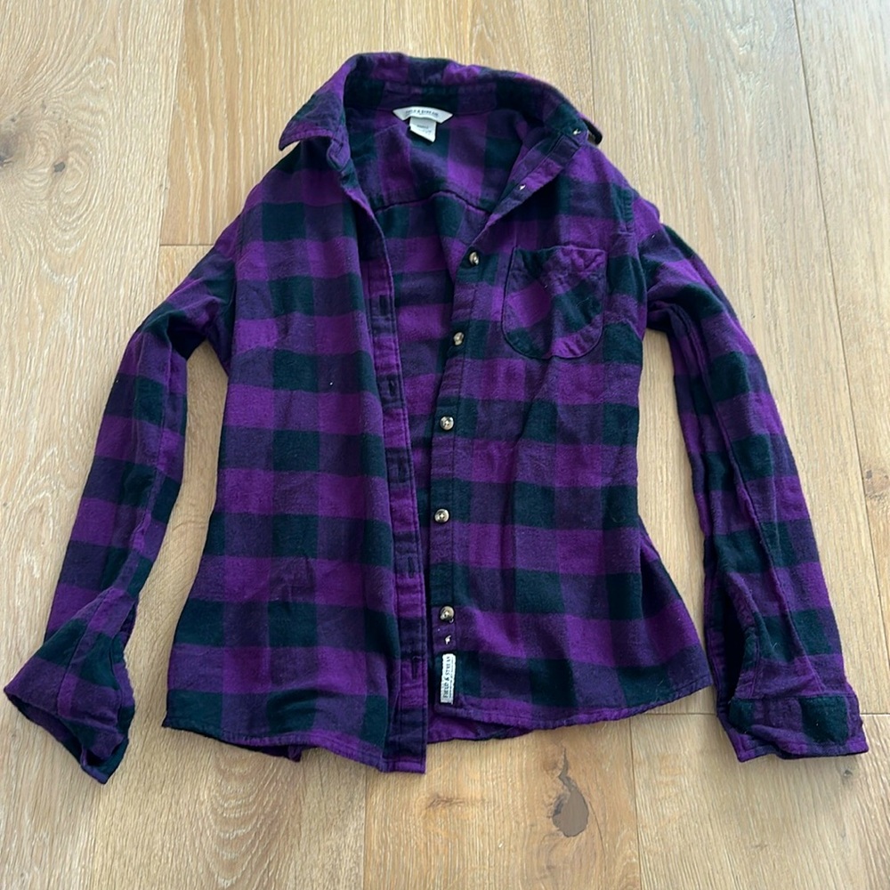 Purple and black flannel. Small. Never worn, tags removed